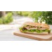 Fladenbrot belegt mit Putenbrust, Sause, Salat, Gurken